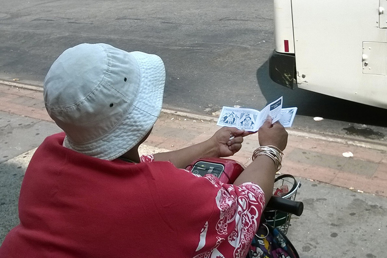 Person reading tract