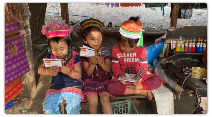 Mission Fund: These Thai children were thrilled to read the gospel in their language.