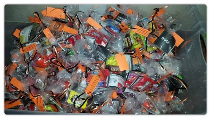 Tracts, candy and a Bible verse with each bag.